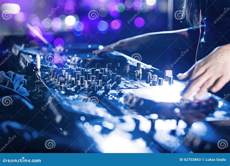 Dj Mixes the Track in the Nightclub. Stock Image - Image of male ...