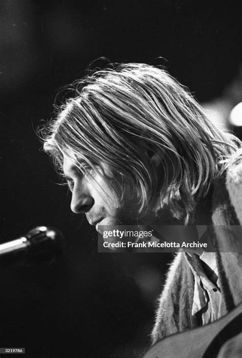 American Singer And Guitarist Kurt Cobain Performs With His Group