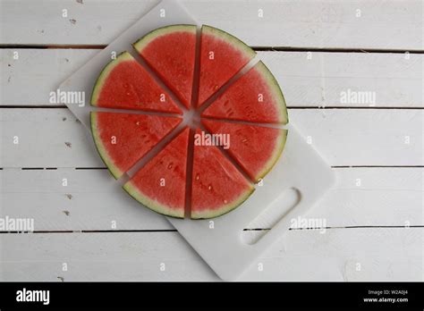 Delicious Watermelon Cut Into Triangles Stock Photo Alamy