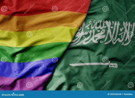Big Waving Realistic National Colorful Flag Of Saudi Arabia And Rainbow Gay Pride Flag Stock