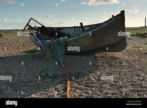 Derelict Fishing Boat Abandoned On Dungeness Beach Stock Photo Alamy