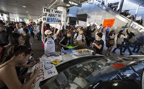 Protesters block LAX traffic, face off with police as they rally ...