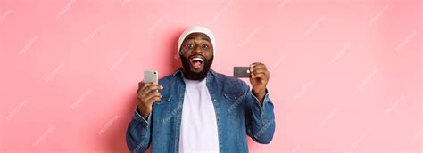 Premium Photo Online Shopping Happy Bearded Africanamerican Man