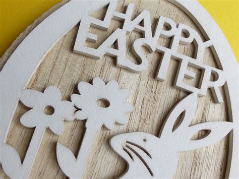 Happy Easter Sign And Rabbit Carved Of Wood Creative Commons Stock Image