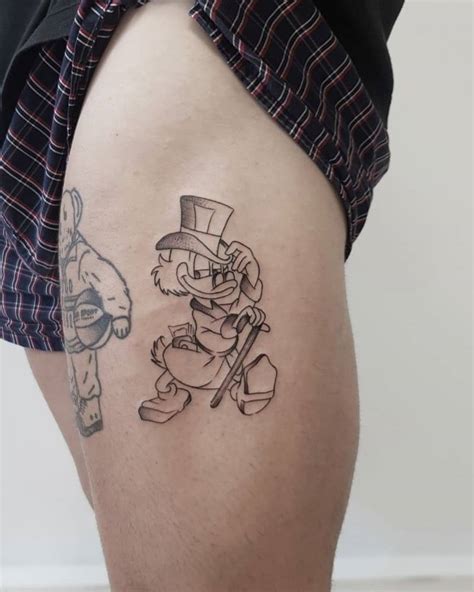 Scrooge McDuck Tattoo Located On The Thigh