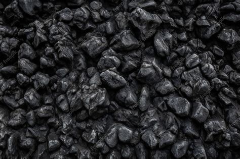 Premium AI Image | Black coal texture background Black coal texture