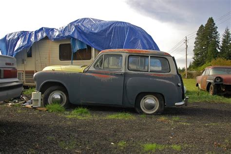 OLD PARKED CARS.: 1954 Hillman Husky.