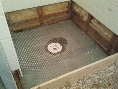 Shower floor repair - demo and pre-pan - Creative Tile Works