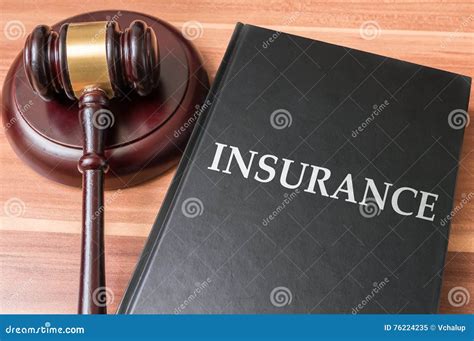 Book With Insurance Laws Justice And Legislation Concept Stock Image