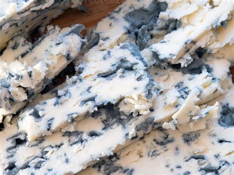 Tasty moldy cheese texture background. Blue mold cheese close up ...