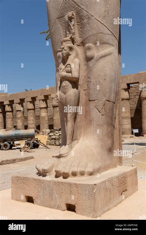 The Statue Of Ramses Ii With His Daughter Merit Amon In The Temple Of Amun Ra In Karnak Luxor