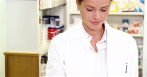 Pharmacist Making Prescription Record In Laptop Stock Footage Videohive