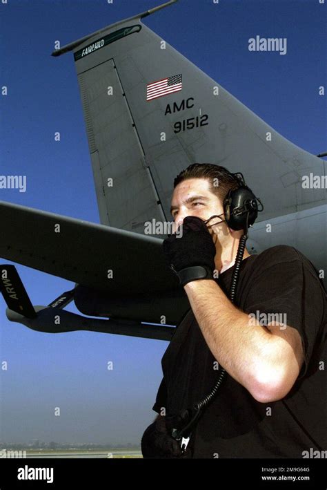 Staff Sergeant John Chasse 92d Aircraft Generation Squadron Speaks To The Aircraft Commander