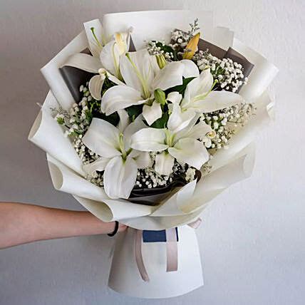 Charming White Lilies Bouquet - FNP Corporate