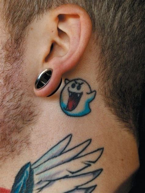 Amazing cartoon ghost tattoo behind ear - Tattooimages.biz