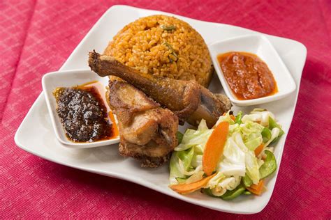 Ghanaian Jollof Rice & Chicken | African food, Ghanaian food, Africa food