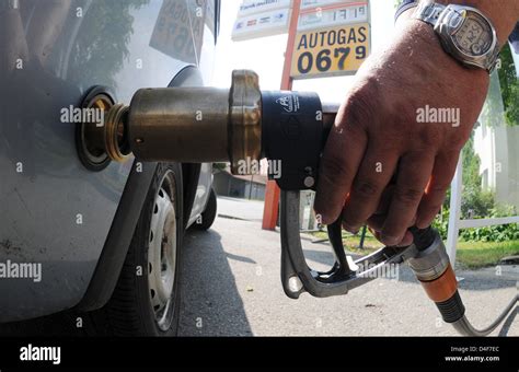 A Driver Fuels His Car With Liquefied Petroleum Gas Lpg At A Petrol