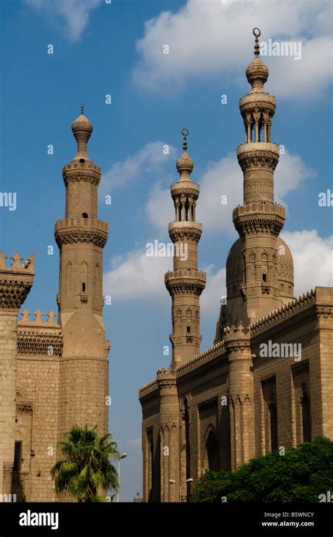 Minarets Of Al Rifa I Mosque Right And Mosque Madrassa Of Sultan