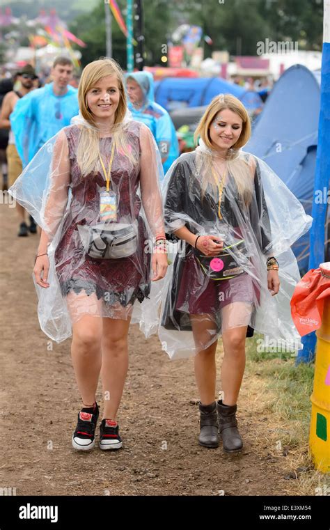 Festival Goers During Rain At Glastonbury Music Festival England Stock