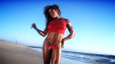 Bodybuilder Alexis Ellis Flaunting Her Big Muscles In Red Lingerie