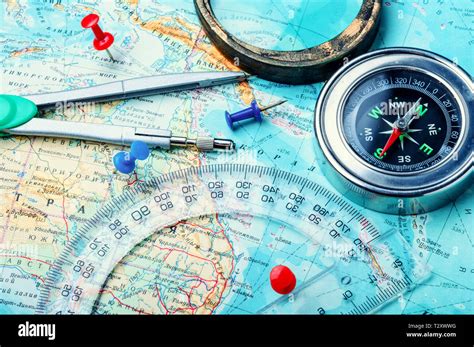 Retro compass with vintage map.Compass on map background Stock Photo ...