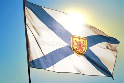 Nova Scotia Province Of Canada Flag Waving On The Wind Stock Photo