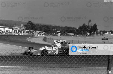 Jean Pierre Beltoise Matra MS120B Leads John Surtees Surtees TS9 Ford