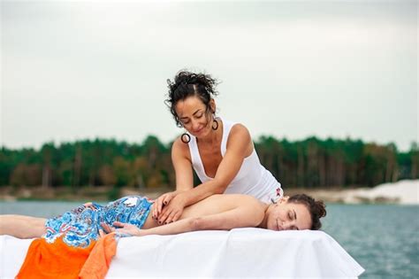 Premium Photo Woman Enjoying Traditional Thai Massage