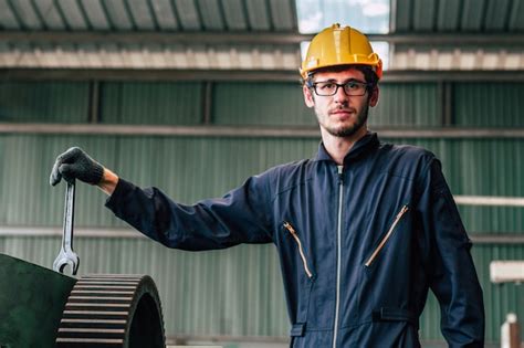 Premium Photo Happy Worker Nerdy Glasses Working In Industry Factory