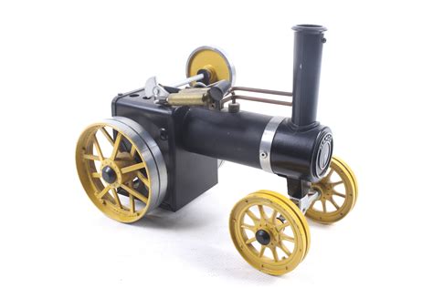 A Mamod Live Steam Traction Engine And Log Carrier Black Body With