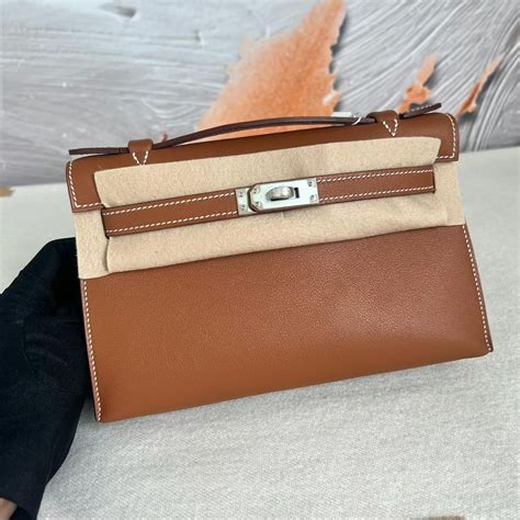 愛馬仕包包新加坡價格及圖片大全 Hermes Mini Kelly Pochette Swift Gold 金棕色 銀扣 Qatar