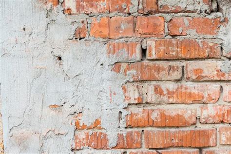 Textura De Uma Velha Parede De Tijolos Vermelhos Quebrada Argamassa