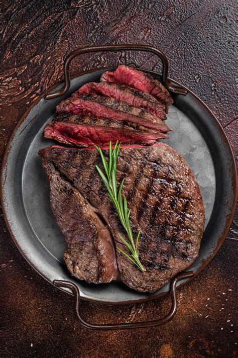 Grilled Medium Rare Top Sirloin Beef Steak Or Rump Steak On A Steel