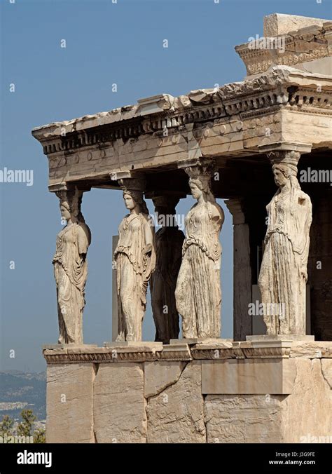 Statues Of Goddesses On The Old Temple Of Athena On The Acropolis In