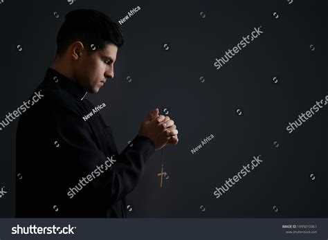 Priest Cross Praying On Black Background Stock Photo (Edit Now) 1995010361