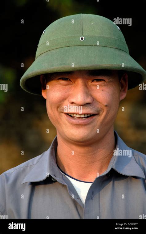 Smiling Vietnamese Man Wearing A Vietnamese Helmet Portrait Dien Bien