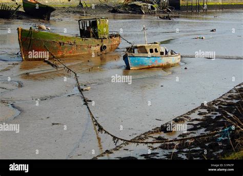 Abandoned Wrecked Boats In Sand Stock Photo Alamy