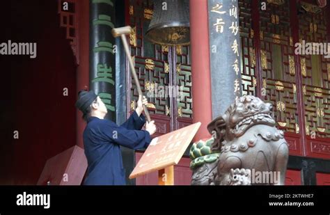 China Taoist temple bell ringing Stock Video Footage - Alamy