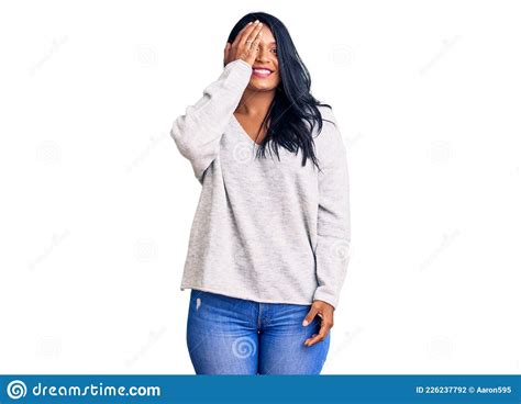 Hispanic Woman With Long Hair Wearing Casual Clothes Covering One Eye