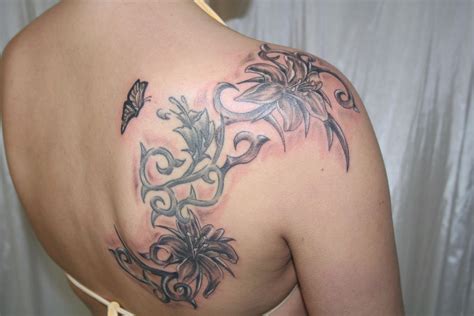 Flower Tribal Butterfly Tattoo by 2Face-Tattoo on DeviantArt