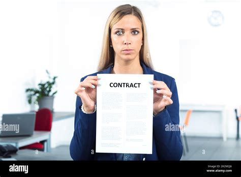 Woman Holding And Showing A Contract Stock Photo Alamy