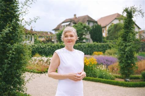 Outdoor Portrait Of Beautiful Mature 50 55 Year Old Woman Stock Photo Image Of Healthy