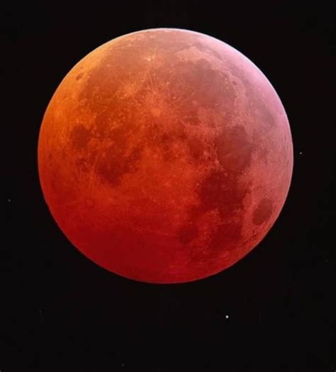 The Blood Moon Is Seen In This Image