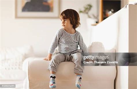 66,039 Kid Sitting On Couch Stock Photos, High-Res Pictures, and Images ...