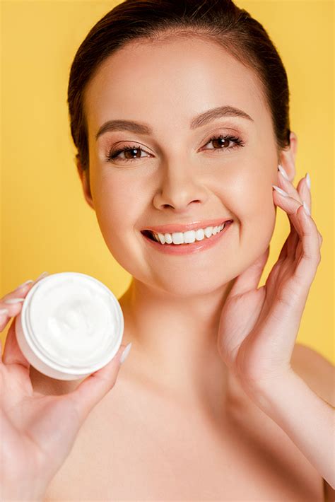 Happy Beautiful Naked Woman Holding Container With Cosmetic