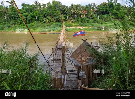 Bamboo Bridge Over The Nam Kahn River Near Its Confluence With The