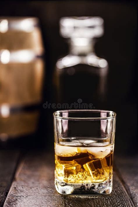 Glass Of Aged Whiskey Grain Distilled Alcohol With Malt Aged In Barrels Stock Image Image