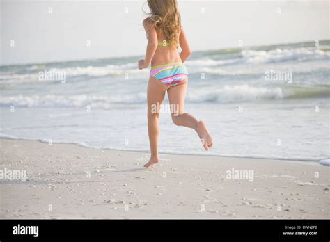 Usa Florida St Pete Beach Rear View Of Girl In Bikini Running