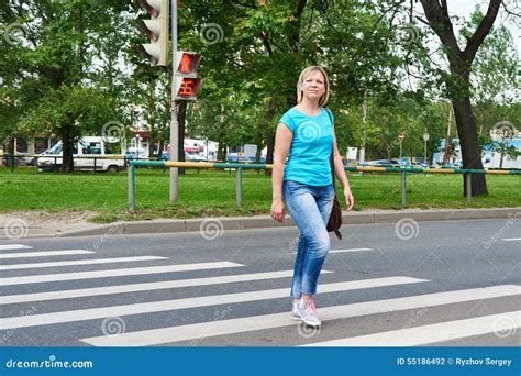 Woman Crossing Street Is Dangerous At Red Light Stock Photo Image Of