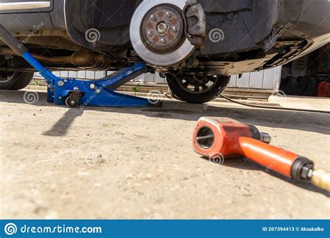 Hydraulic Car Jack Lift The New Car For Change The Tyre Stock Image